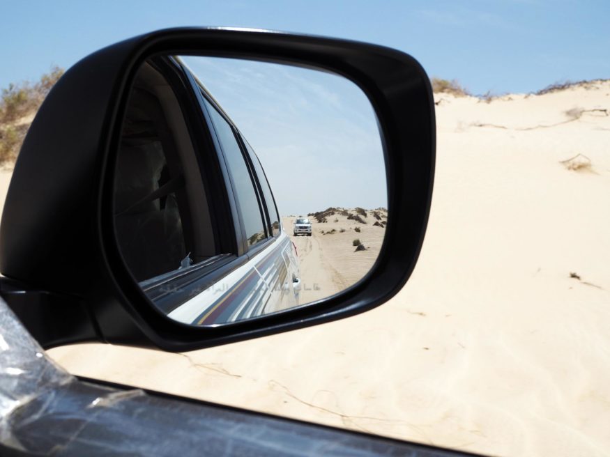 Sand boarding and dune bashing in the desert of Qatar